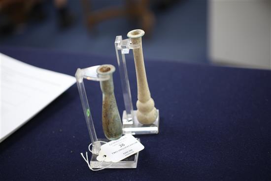 Two Roman glass unguentarium, c, 2nd century A.D., 12 and 9cm